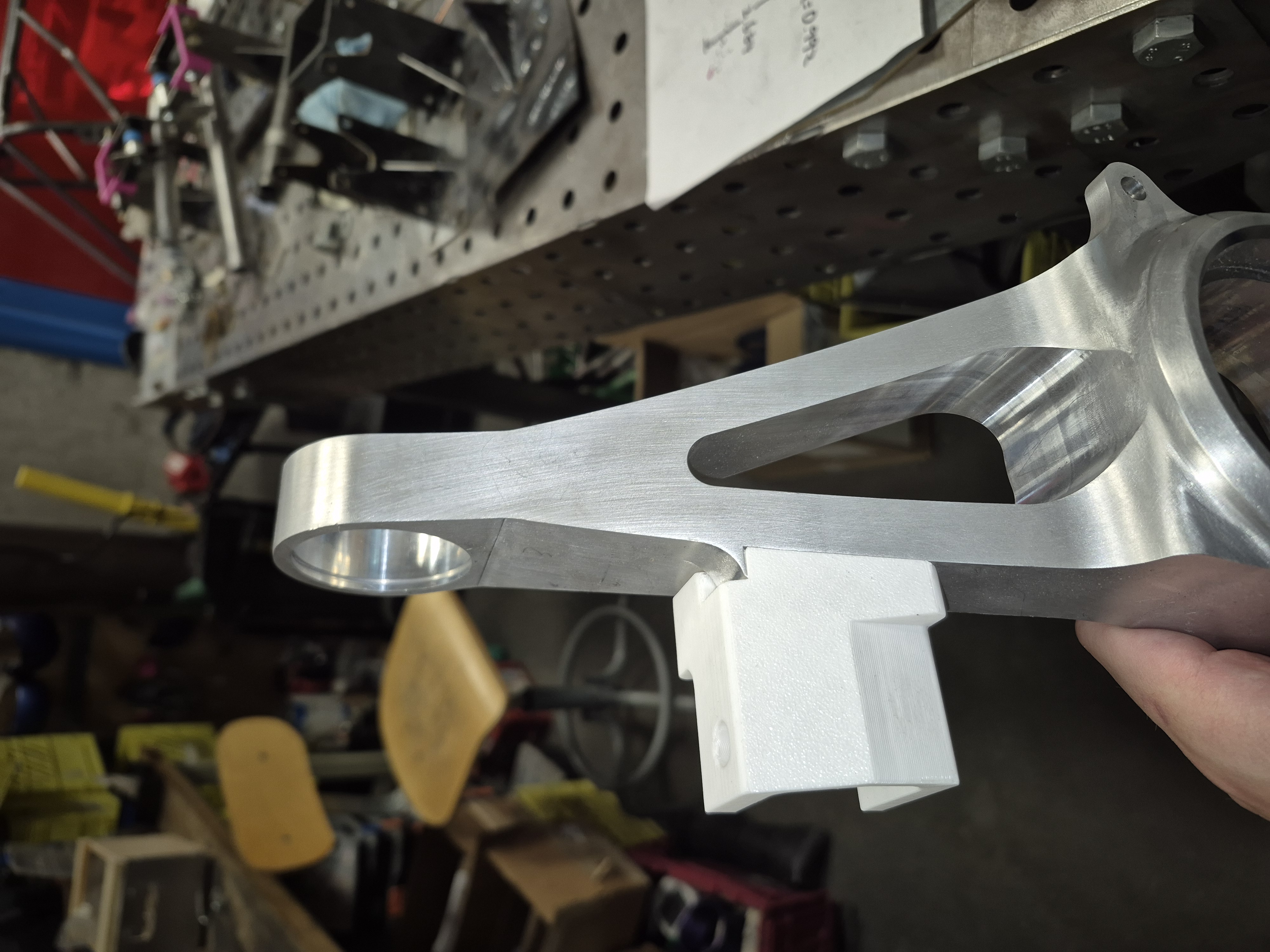 3D printed tie rod tab front-side prototype.