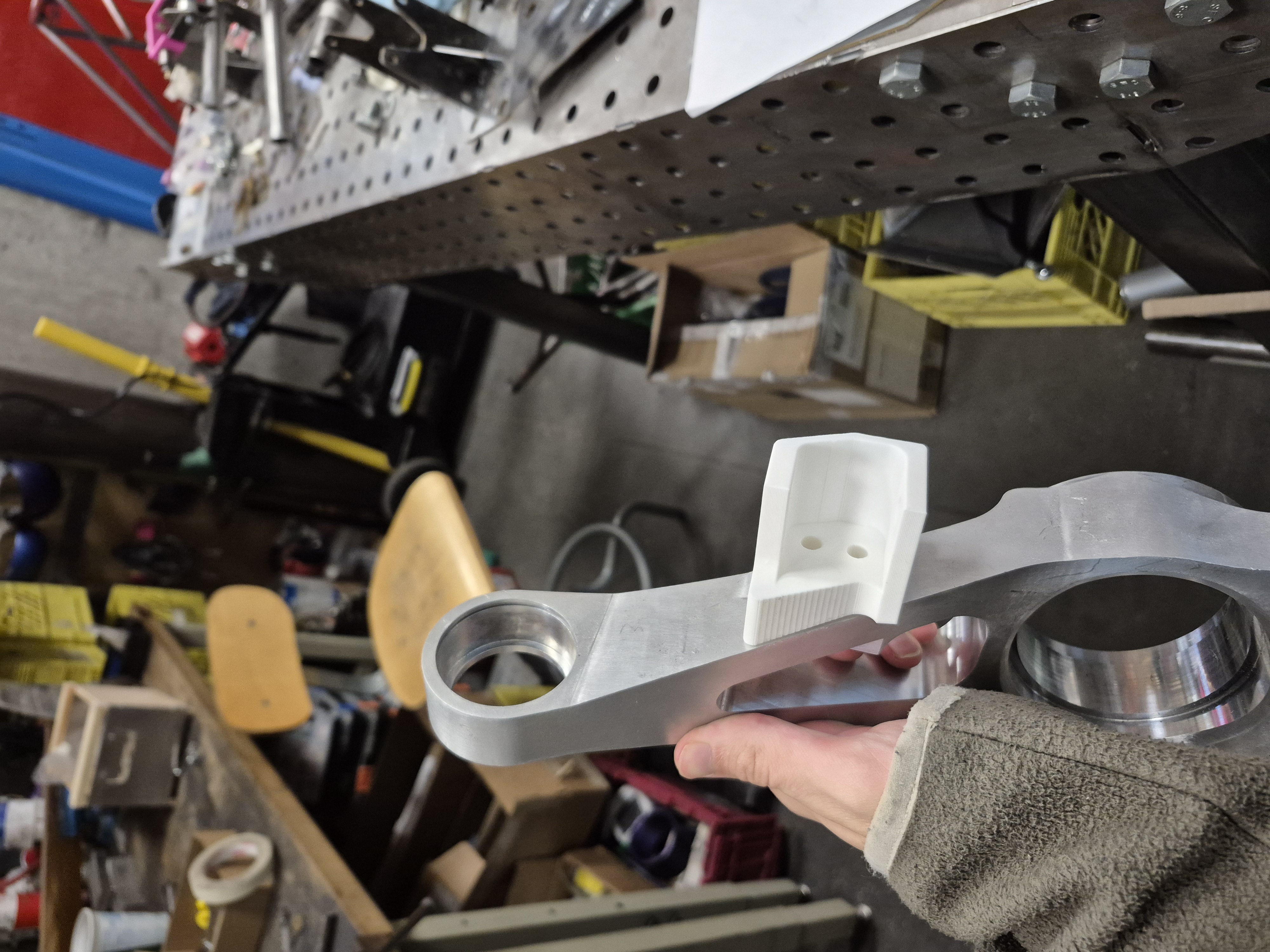 3D printed tie rod tab rear-side prototype.